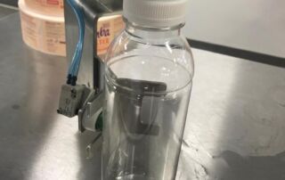 Deckelschrauber Detailaufnahme → RHS Innovation GmbH